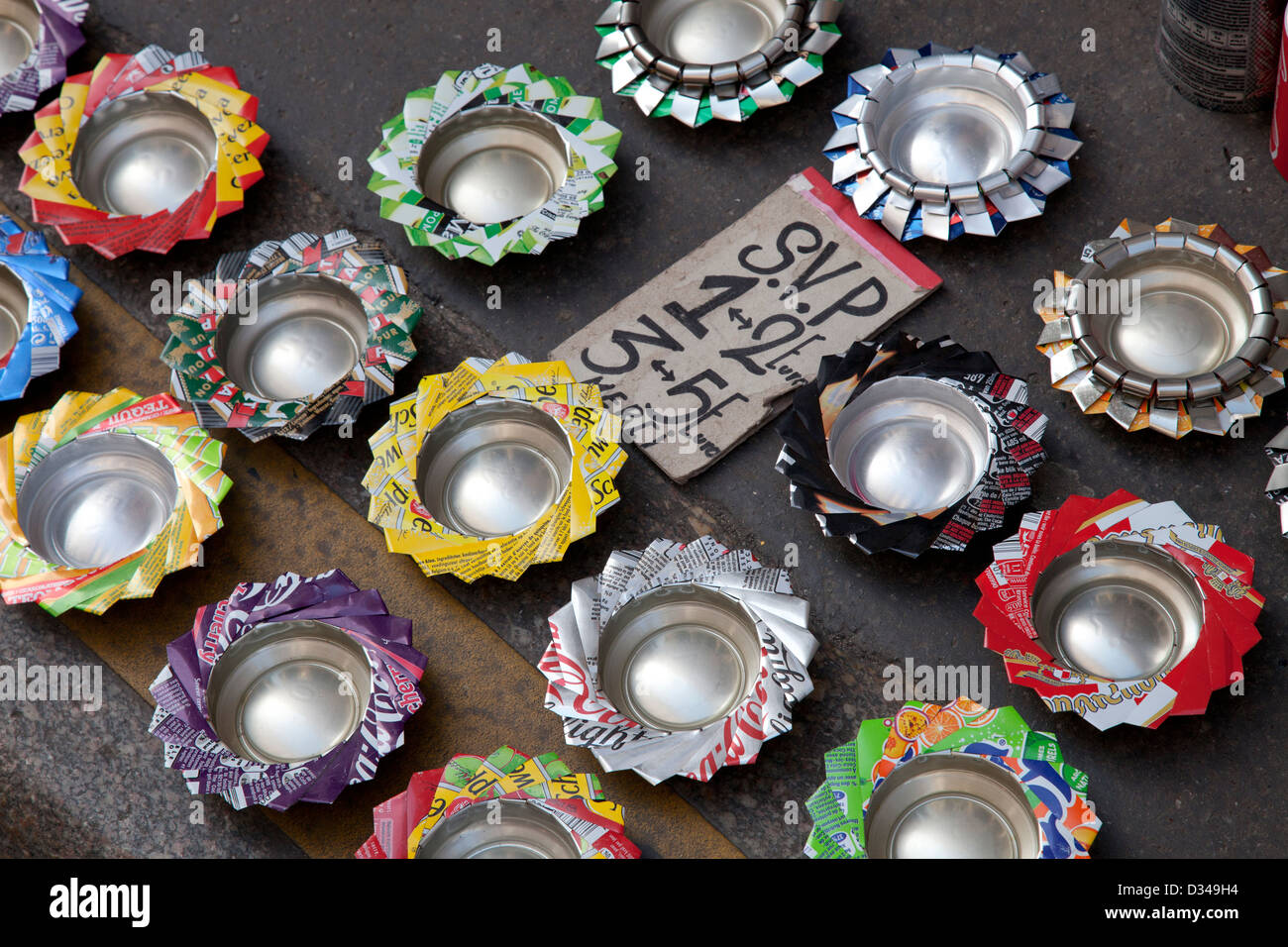 ashtrays made of recycled coke cans Stock Photo Alamy