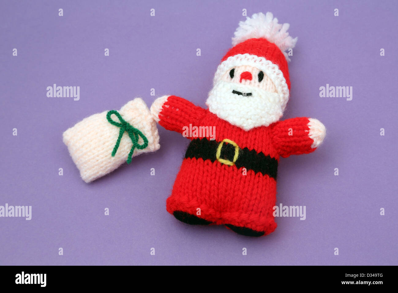 Knitted Santa Claus With Sack Stock Photo