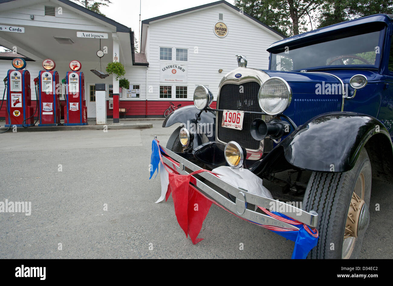 Old Ford truck and classic fuel dispensers. Gustavus petrol station. Alaska. USA Stock Photo