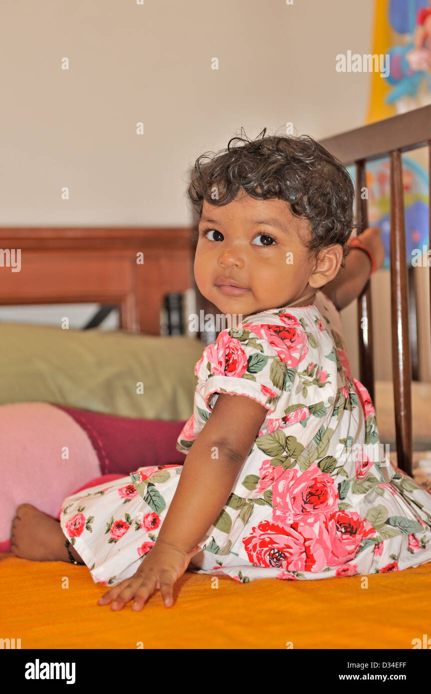 Indian Baby Girl Playing In Her Wooden Crib Stock Photo 53574291