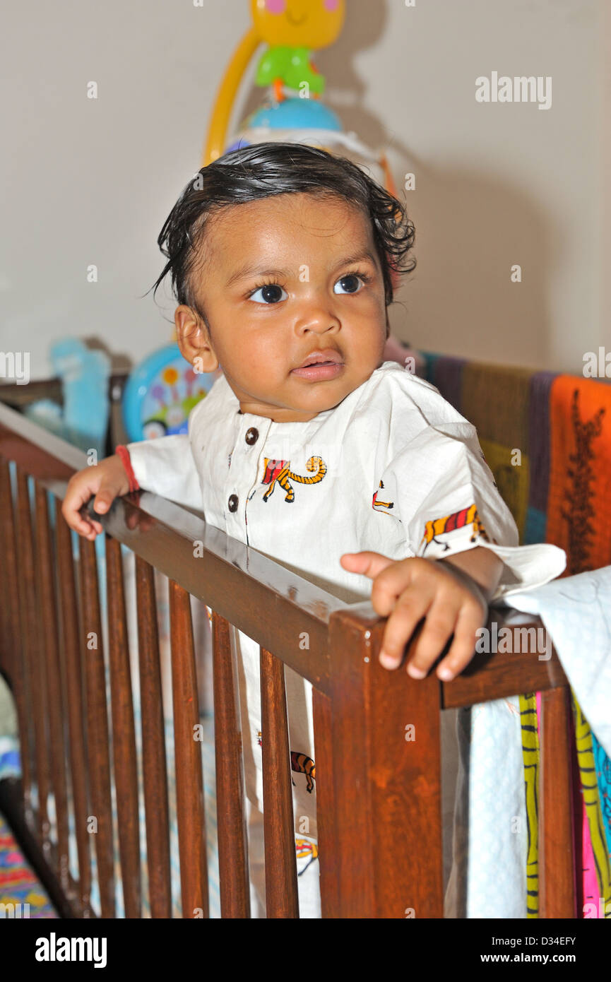 Indian Baby Girl Playing In Her Wooden Crib Stock Photo 53574303
