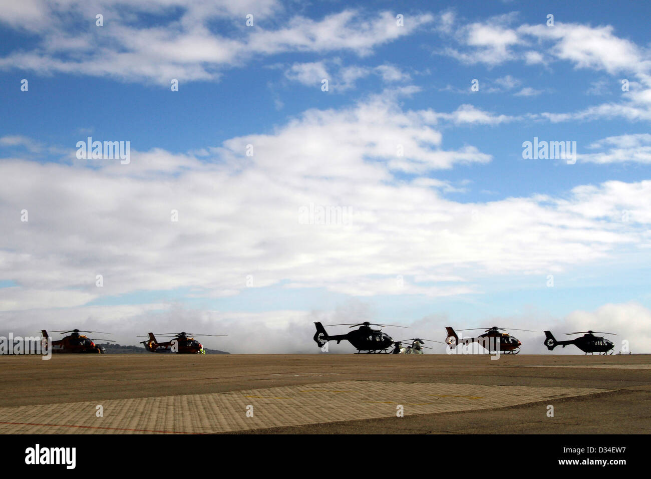 Helicopters fly in the sky hi-res stock photography and images - Alamy