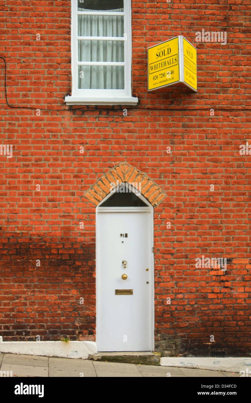 Sold sign on a house in North London, UK Stock Photo