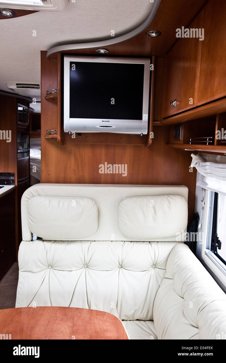 Seating area and TV in the Concorde luxury motorhome Stock Photo