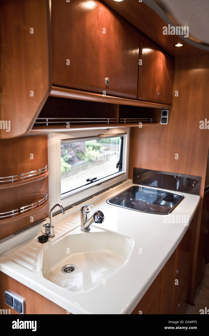 Sink And Hob At Window Of Concorde Luxury Motorhome Stock