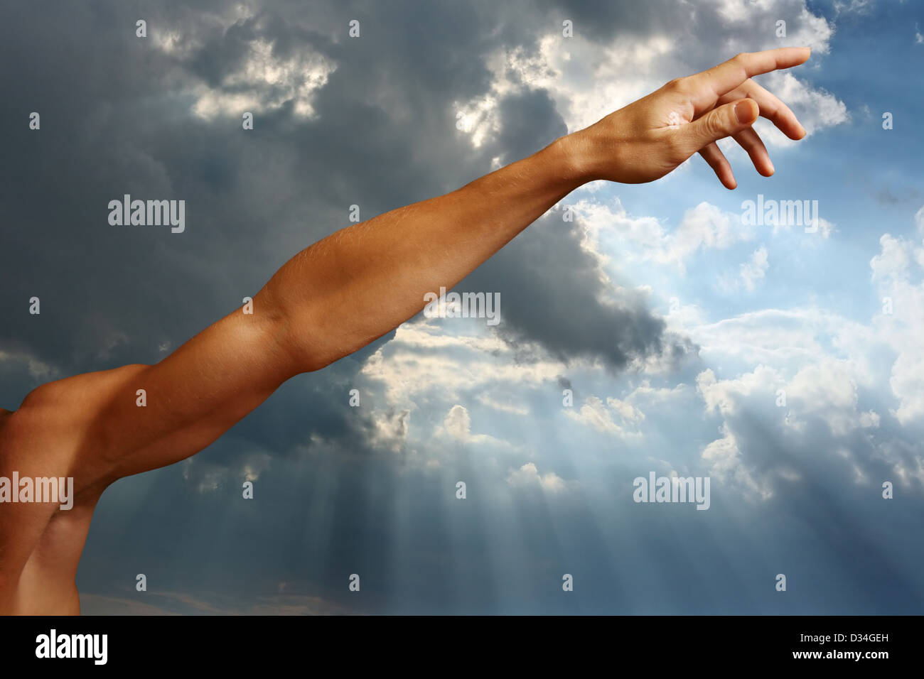 Man's hand on a background of the sky Stock Photo - Alamy