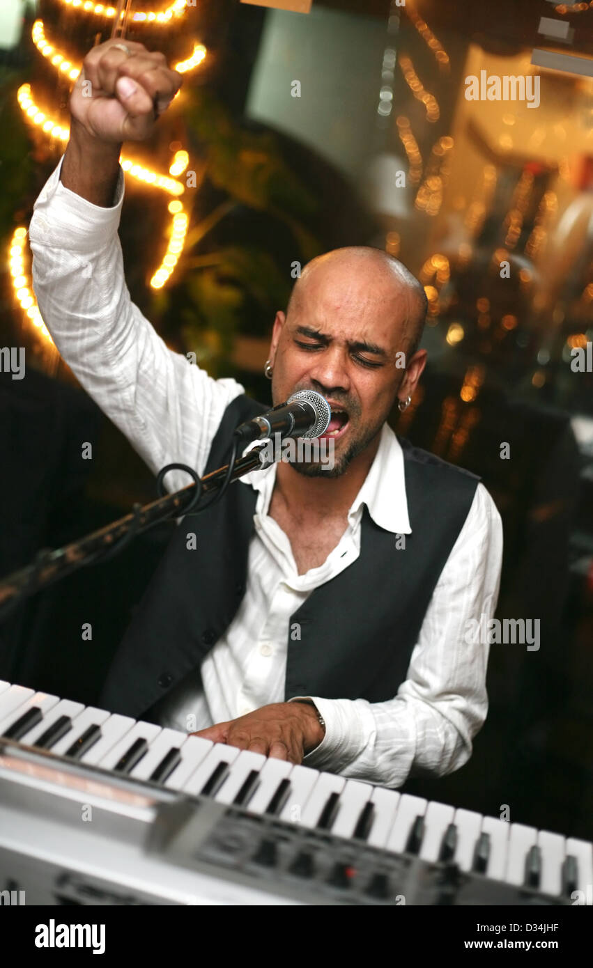 Singer at an alive concert in a night club 'La vida loka'. Bali. Indonesia Stock Photo