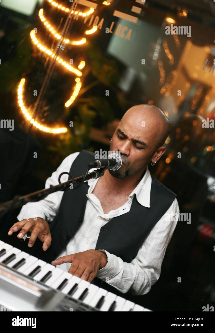 Singer at an alive concert in a night club 'La vida loka'. Bali. Indonesia Stock Photo