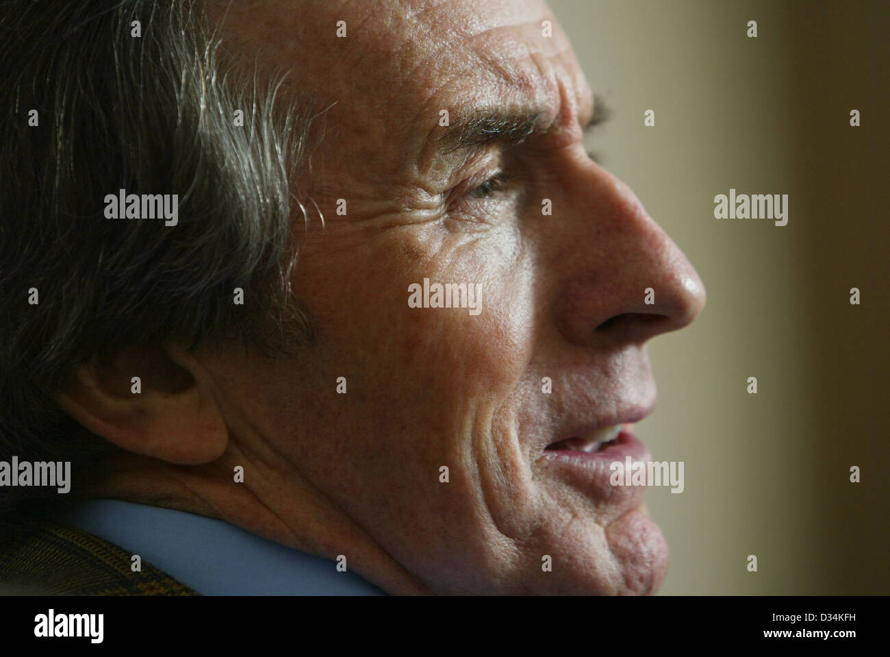 Former Formula 1 World Champion Sir Jackie Stewart being interviewed in his room at Gleneagles Hotel in Scotland Stock Photo