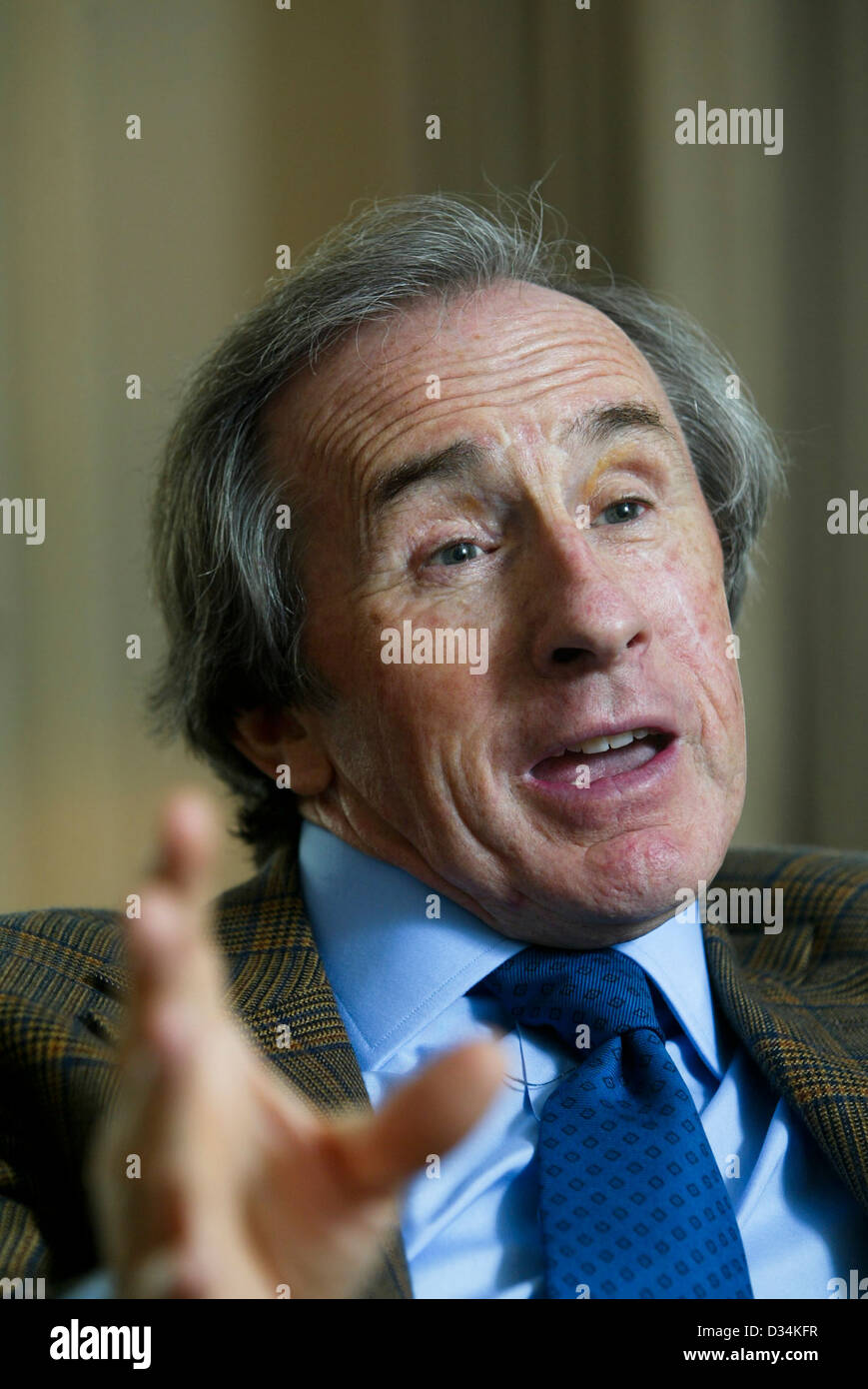 Former Formula 1 World Champion Sir Jackie Stewart being interviewed in his room at Gleneagles Hotel in Scotland Stock Photo