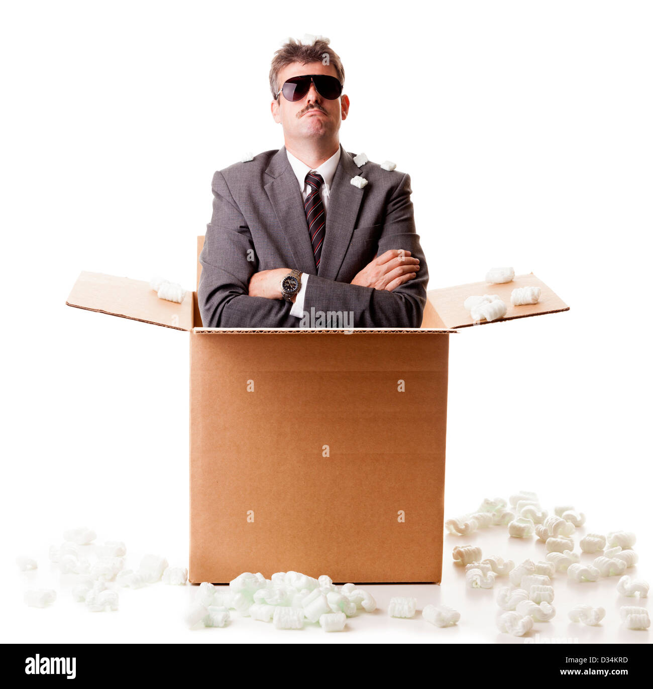 Businessman in the box Stock Photo