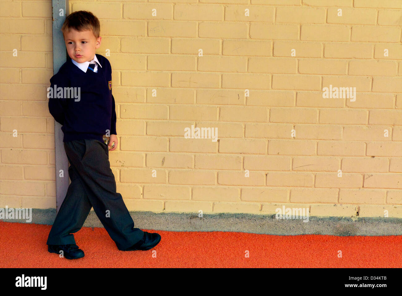 small boy in the schoolyard Stock Photo