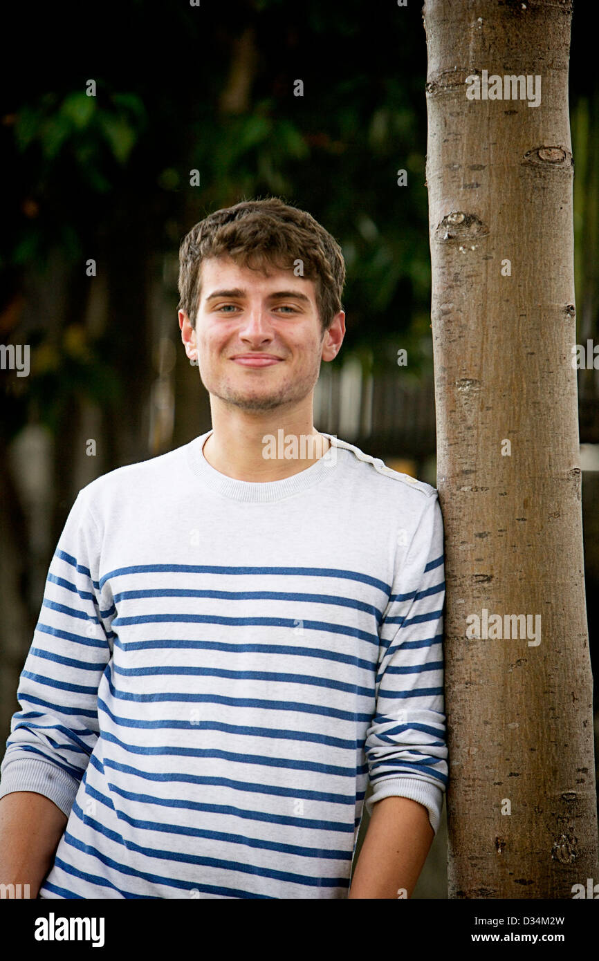 Young adult male standing Stock Photo