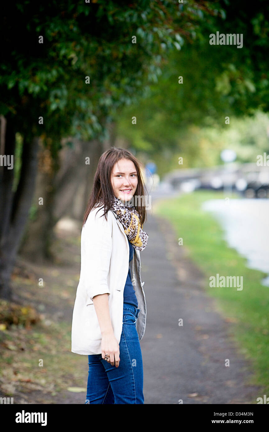 Young female adult brunette girl in an outside portrait Stock Photo