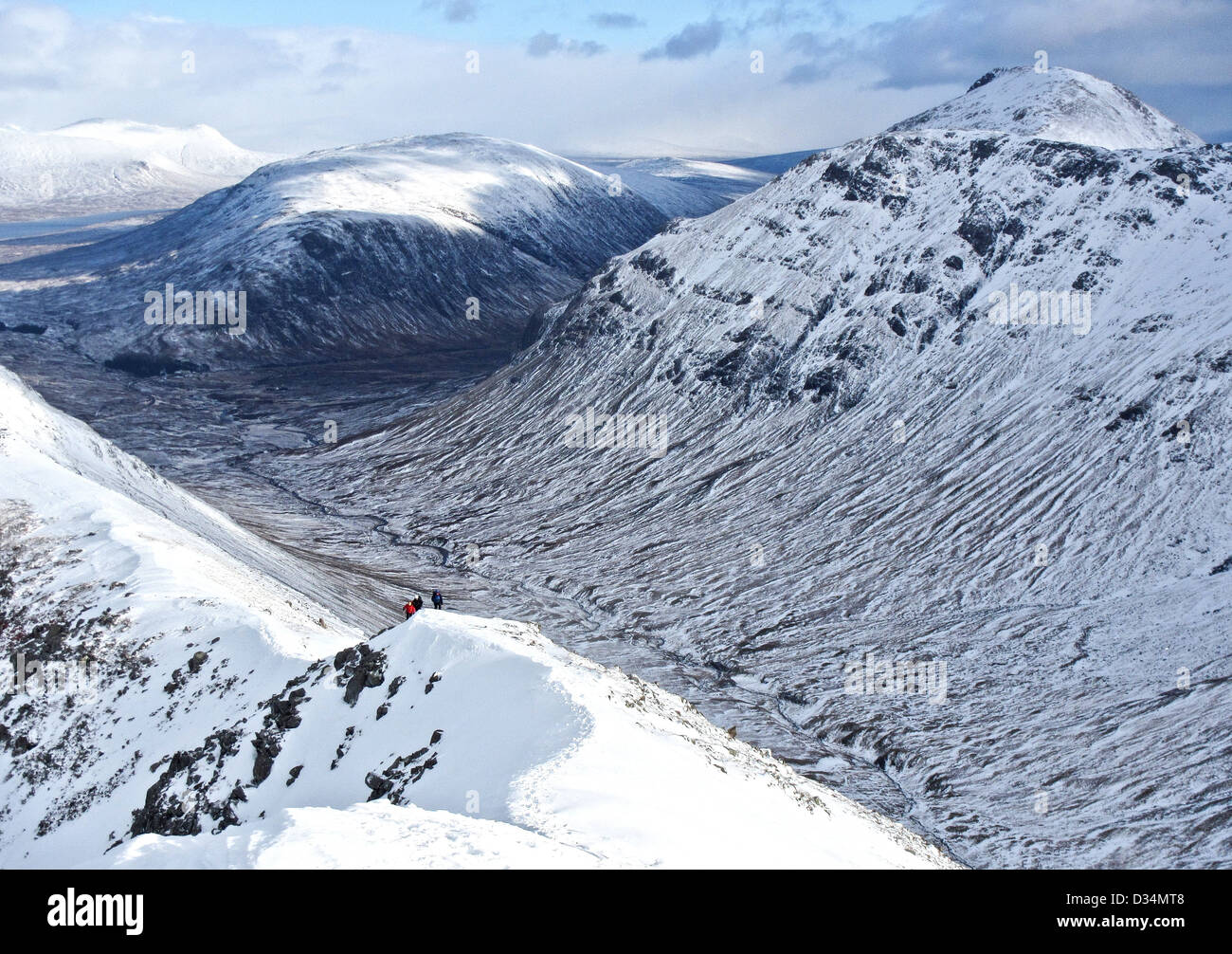 A group of winter mountaineers on the Scottish mountain Buachaille Etive Beag  in Glencoe  in Scottish highlands, Scotland UK Stock Photo