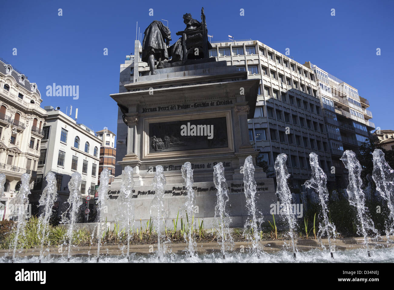 Plaza de Isabel la Catolica. Statue shows Queen Isabel granting Columbus' petition to obtain ships and supplies. Granada Spain Stock Photo