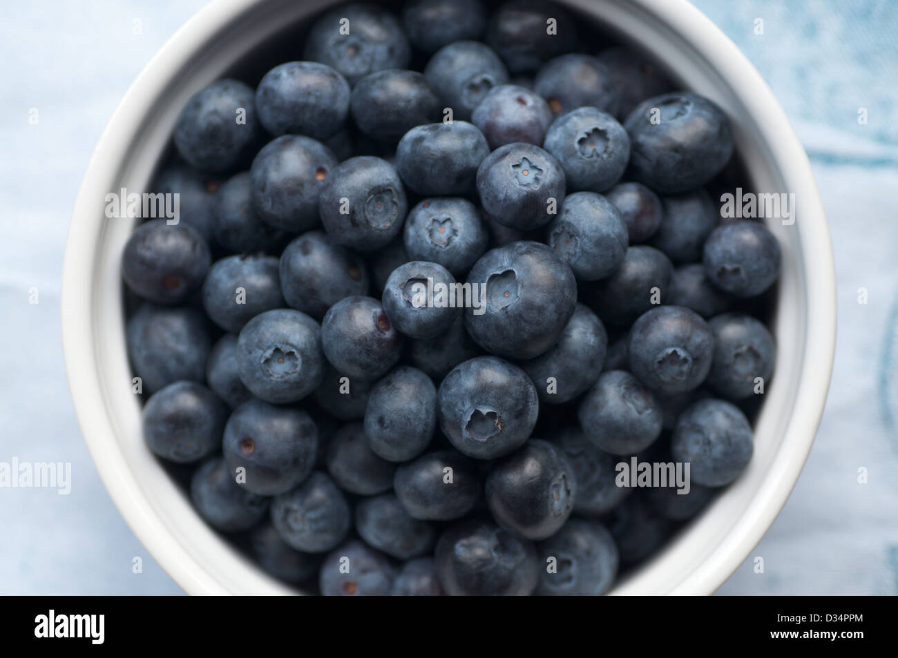 Bowl of beautiful fresh ripe plump blueberries Stock Photo