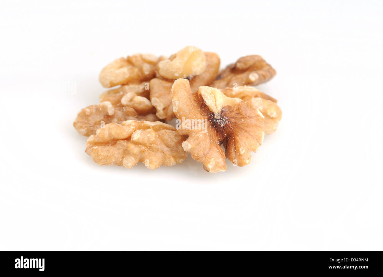 Raw walnuts on a white background Stock Photo