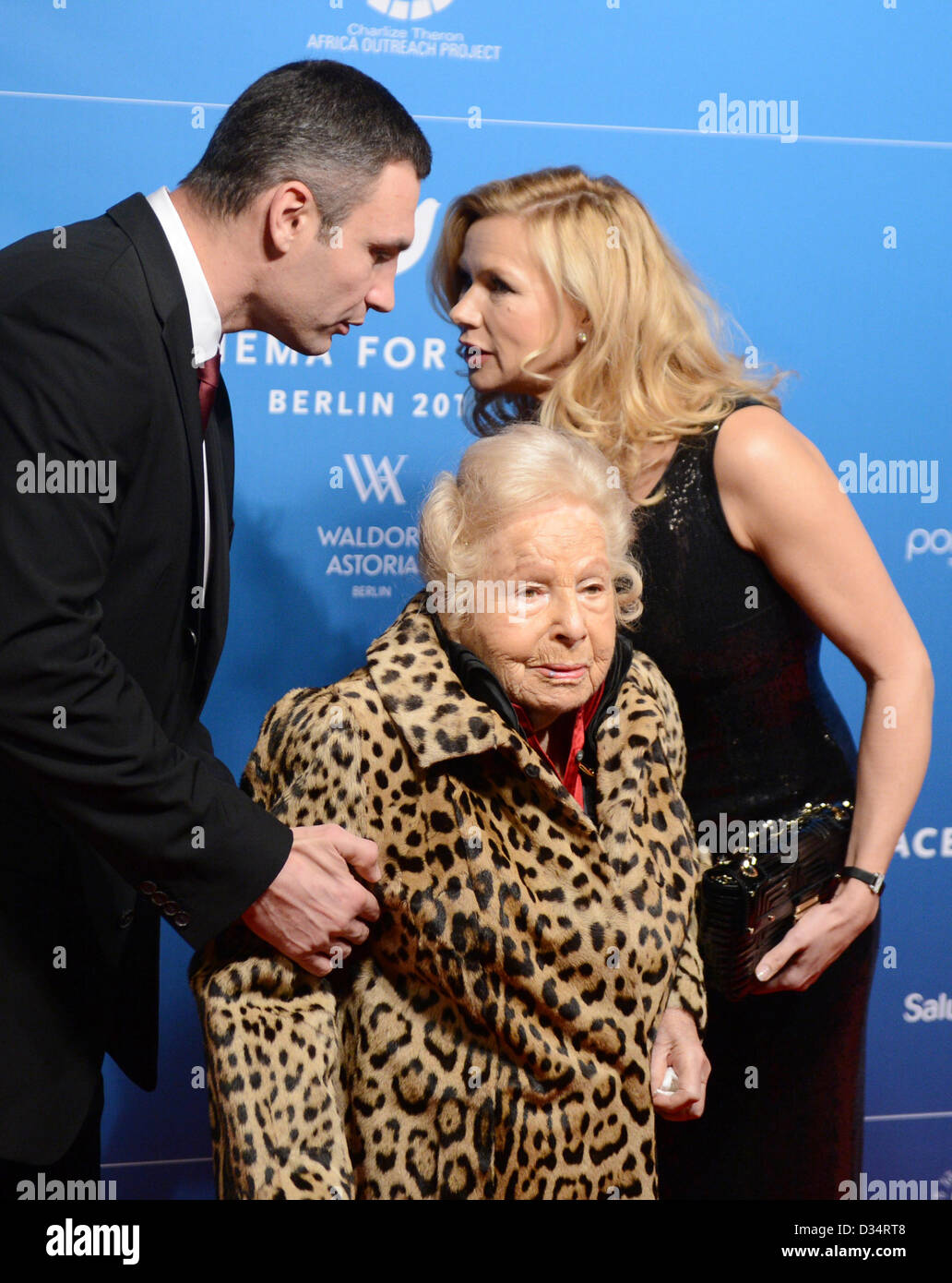 Ukranian boxer and politician Vitali Klitschko (L), Holocaust survivor Marga Spiegel (C) and actress Veronica Ferres  arrive for the charity event Cinema For Peace within the scope of the 63rd Berlin International Film Festival aka Berlinale in Berlin, Germany, 09 February 2013. Since 2002, Cinema for Peace has been a worldwide initiative, promoting humanity through film while inviting members of the international film community to attend the annual Cinema for Peace Award-Gala-Night during the Berlin International Film Festival. Photo: Jens Kalaene dpa +++(c) dpa - Bildfunk+++ Stock Photo