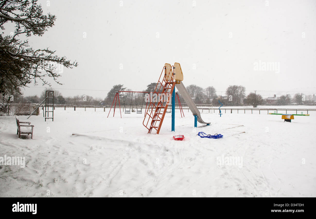 Childrens Playground in the Snow Stock Photo