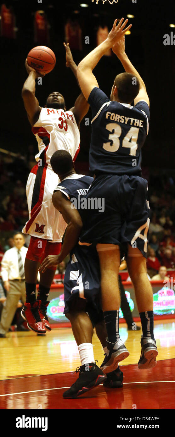 Feb. 9, 2013 - Oxford, Ohio, U.S - Miami (Oh) Redhawks forward Will Felder (33) puts up a shot in front of Akron Zips center Pat Forsythe (34). On Saturday , February 9, 2013 in the first half of play at Millett Hall on the Miami campus in Oxford,Ohio.  As they fall to Akron 54 to 50. (Credit Image: © Ernest Coleman/ZUMAPRESS.com) Stock Photo