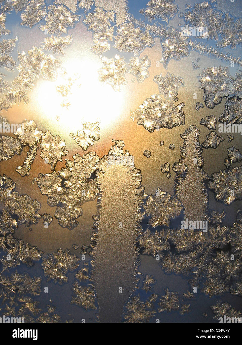 Frosty natural pattern and sunlight on winter window Stock Photo - Alamy