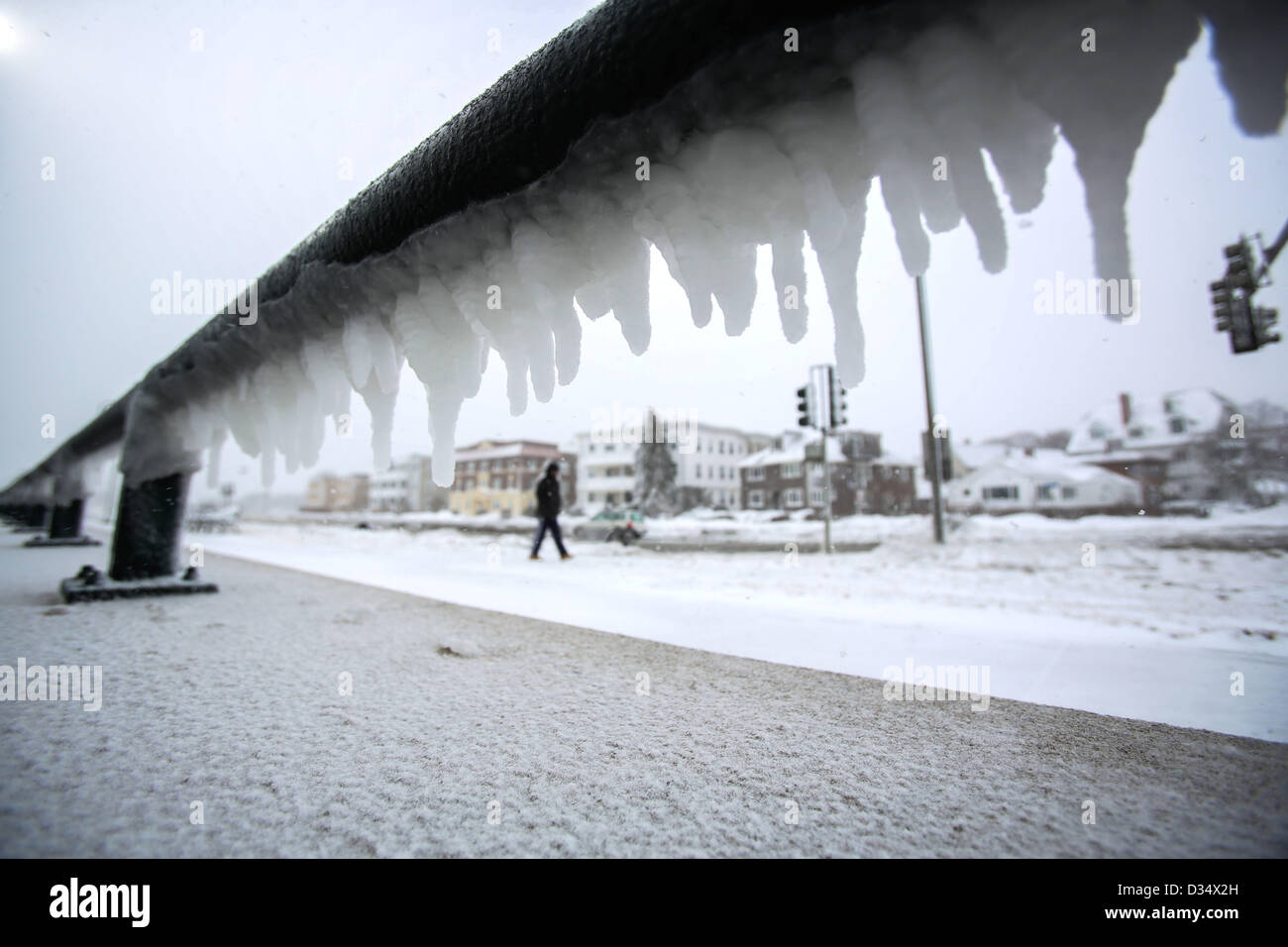 Feb. 9, 2013 - Lynn, Massachusetts, U.S - Frozen seaspray icicles hang from a rail along the coast of New England after the area was hit hard by a powerful blizzard. (Credit Image: Credit:  Nicolaus Czarnecki/ZUMAPRESS.com/Alamy Live News) Stock Photo