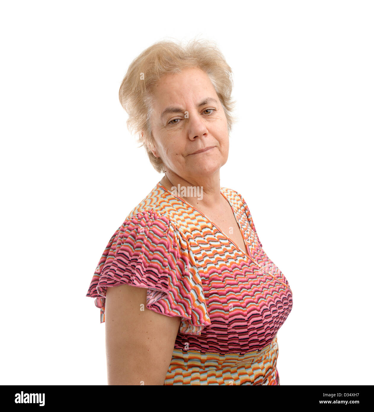 Portrait of confident middle aged woman looking over her right shoulder isolated on white background Stock Photo