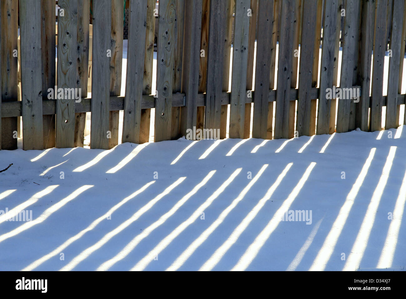 Wooden Fence and Snow Stock Photo - Alamy