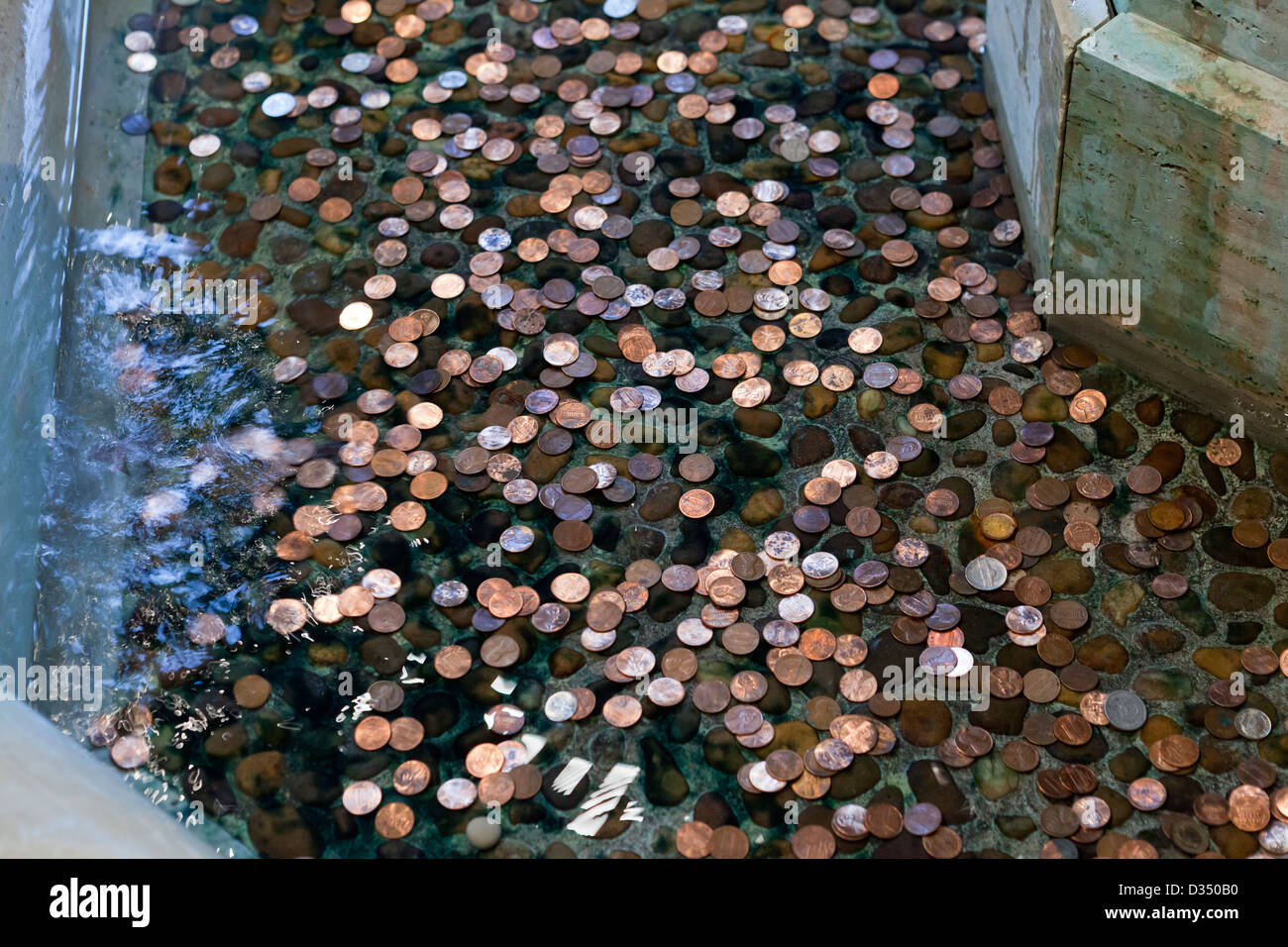 Coins in fountain Stock Photo Alamy