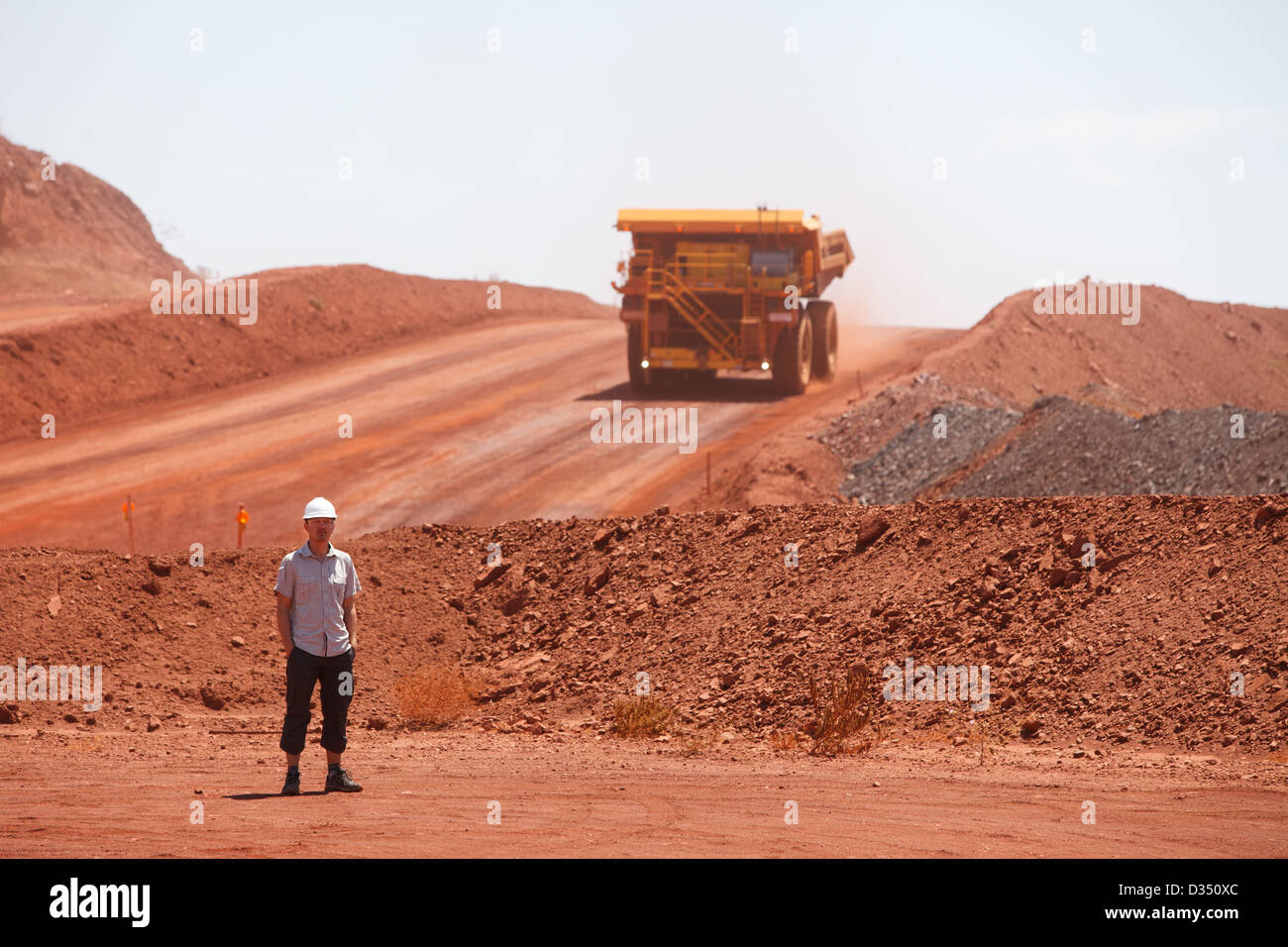 Mining truck working in iron ore mines, Western Australia Stock Photo