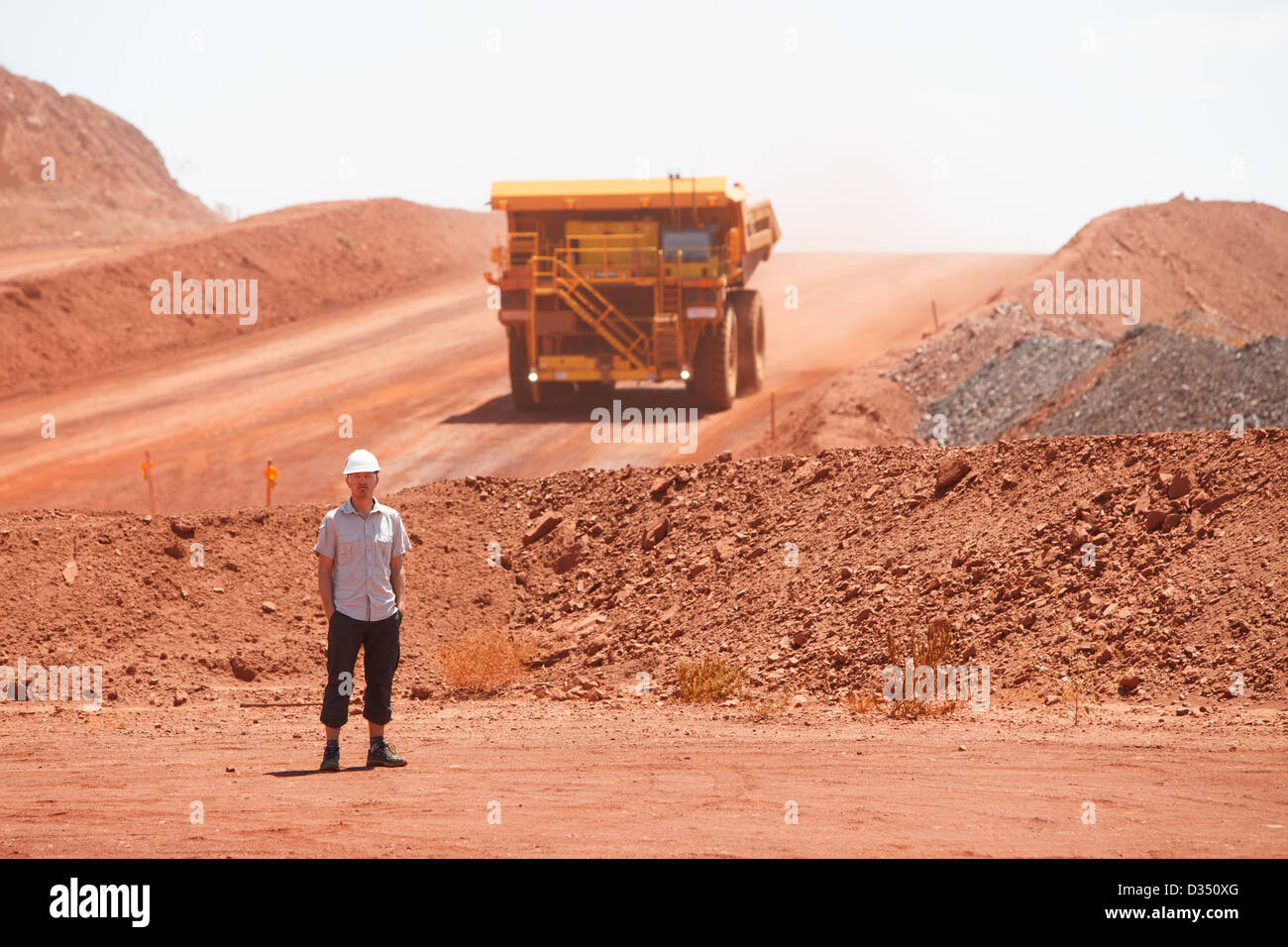 Mining truck working in iron ore mines, Western Australia Stock Photo