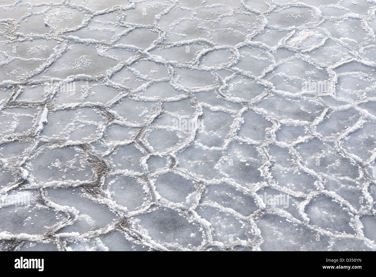 Fozen water surface on the frozen lake Stock Photo
