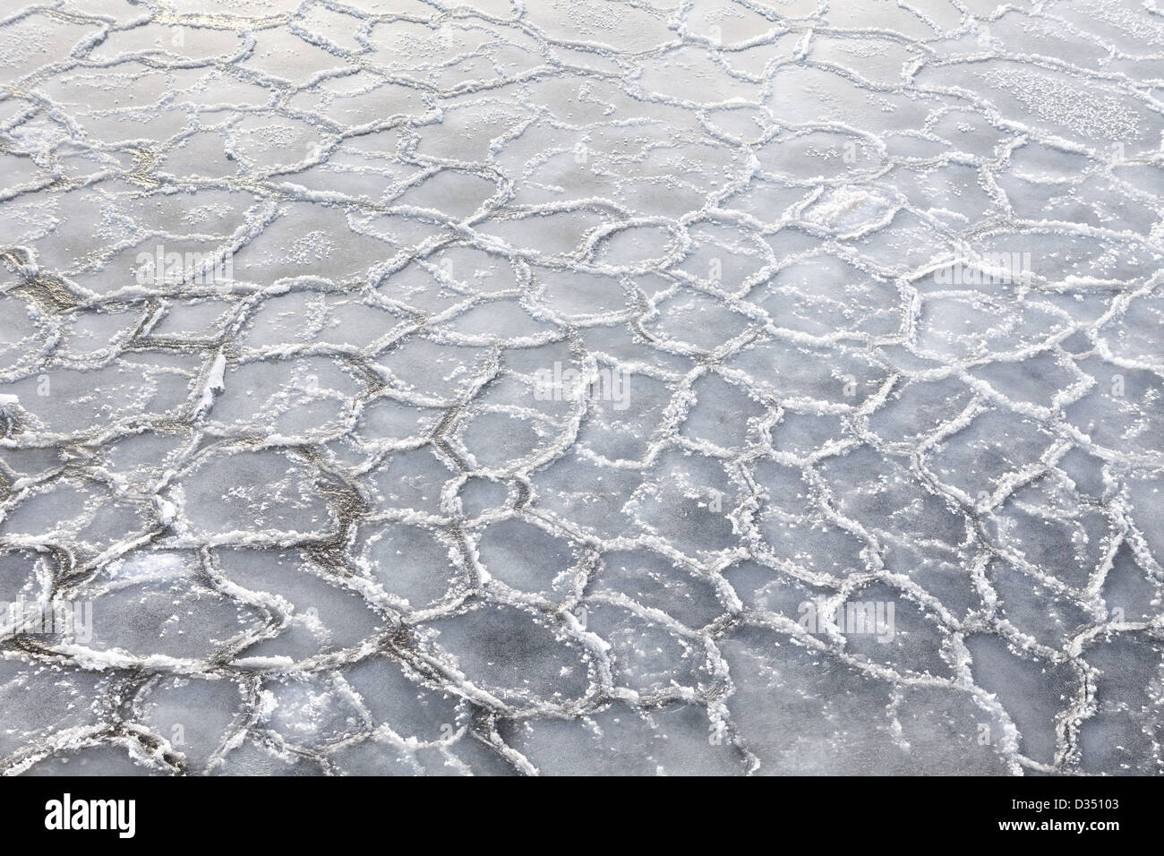 Fozen water surface on the frozen lake Stock Photo