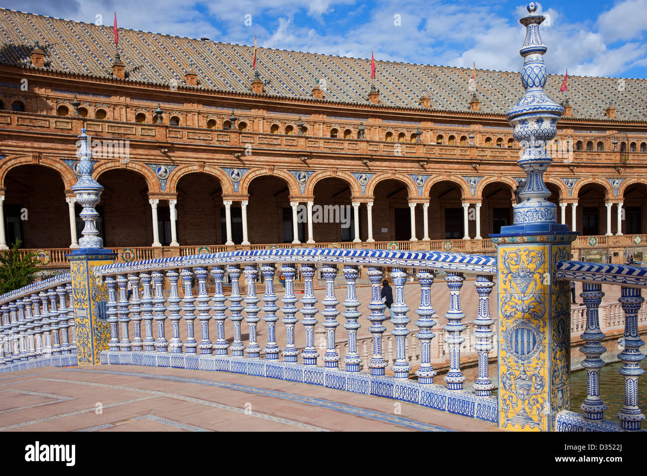 Bridge balustrade decorated with painted Azulejos tiles on Plaza De Espana in Seville, Spain. Stock Photo