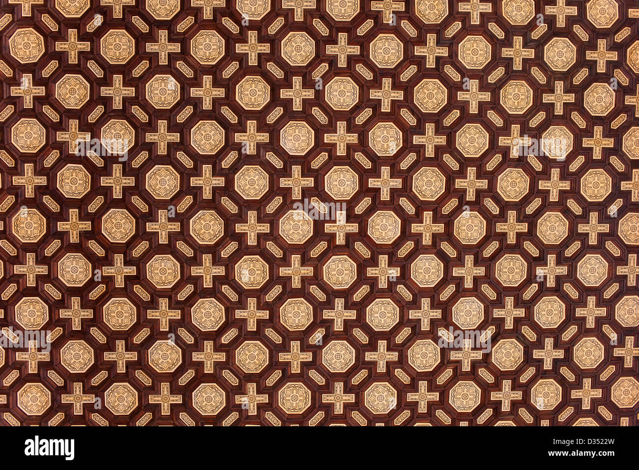 Traditional background design with cross and octagon shapes on Plaza de Espana corridor ceiling, Spain. Stock Photo