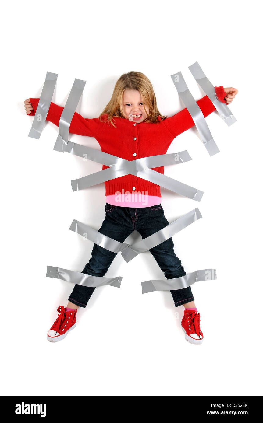 Young girl tied to the wall with duct tape Stock Photo Alamy