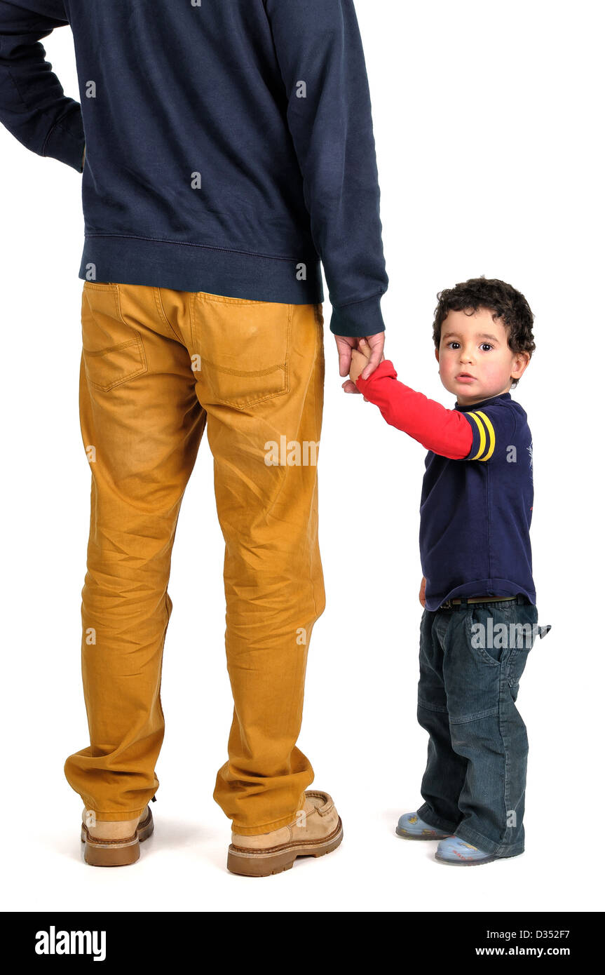 Young boy hand holding his father Stock Photo