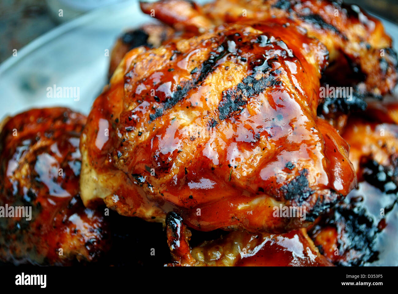 Crispy Barbeque Chicken Thighs Stock Photo Alamy