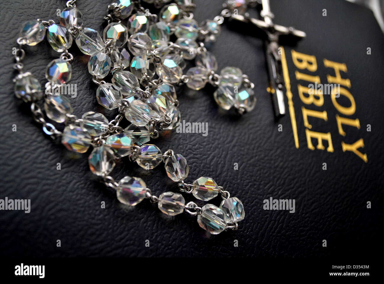 Rosary Beads on a Bible Stock Photo Alamy
