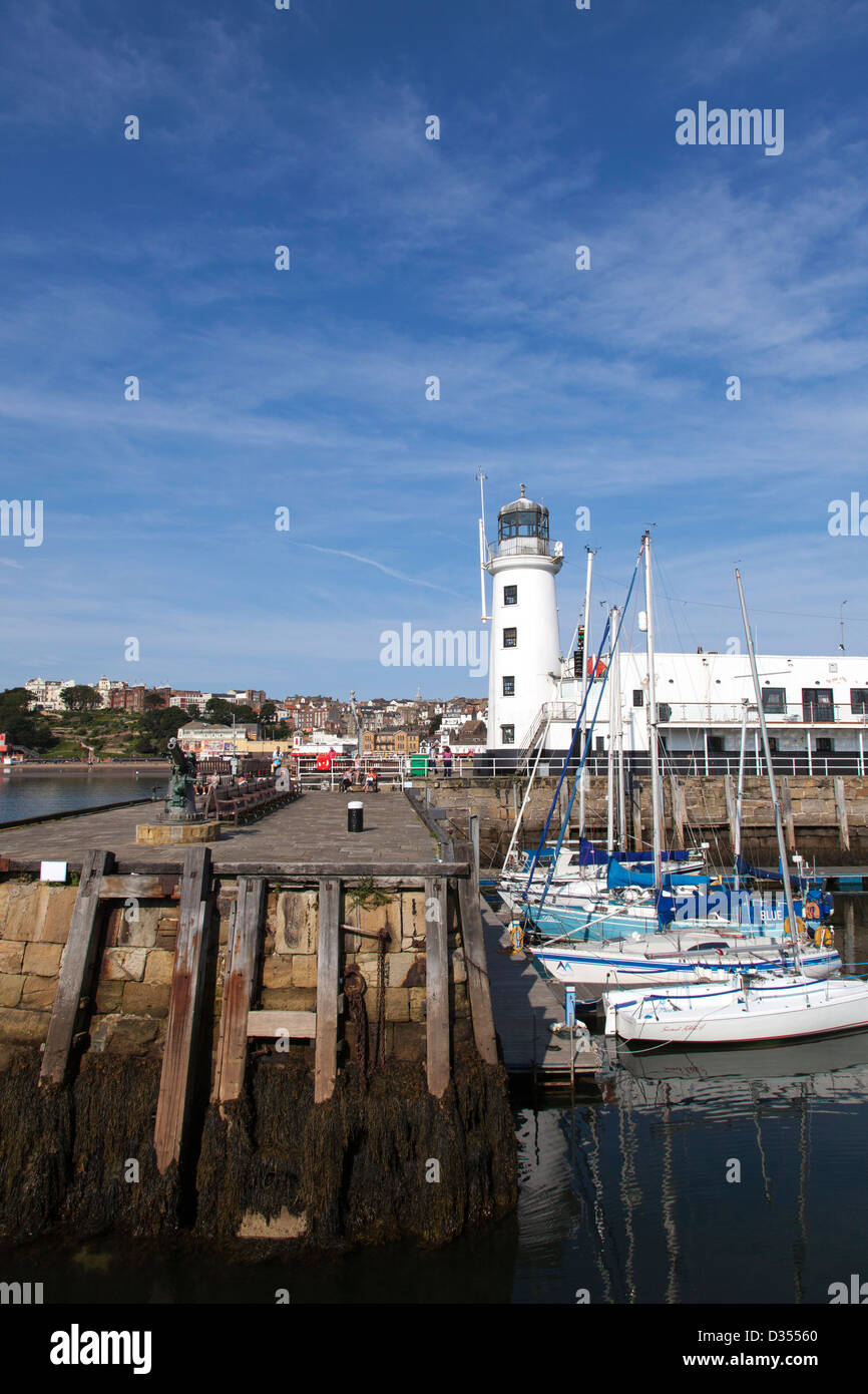 The harbour & lighthouse at Scarborough, North Yorkshire, England, U.K. Stock Photo