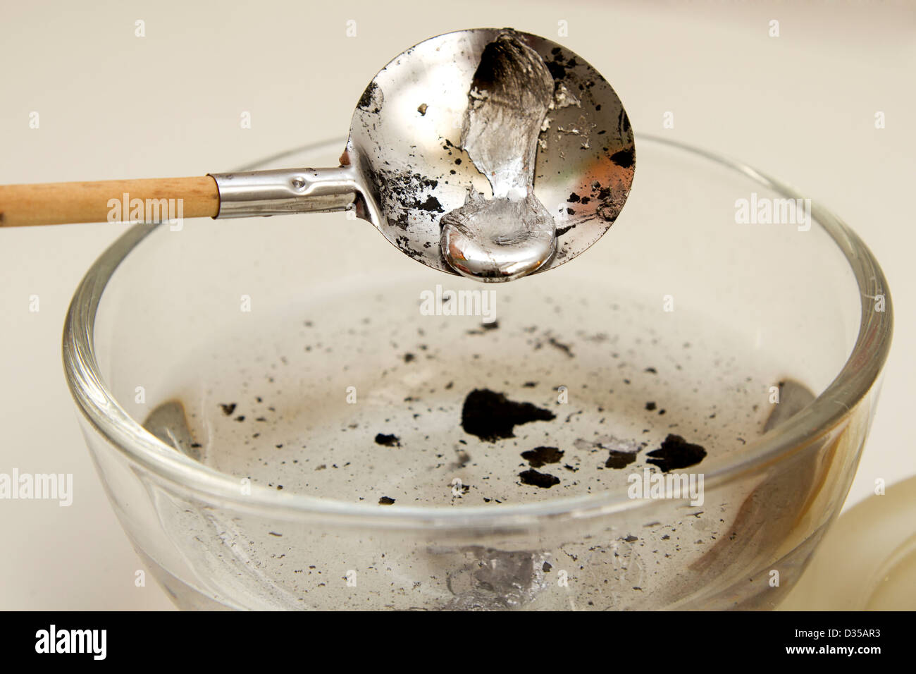 New year tradition melting lead Stock Photo