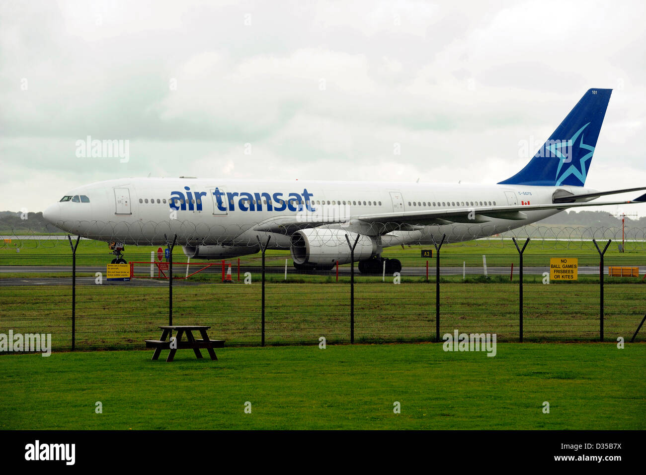 Air Transat Airbus A330-243 registration C GGTS taxis to the apron at Manchester Airport Stock Photo