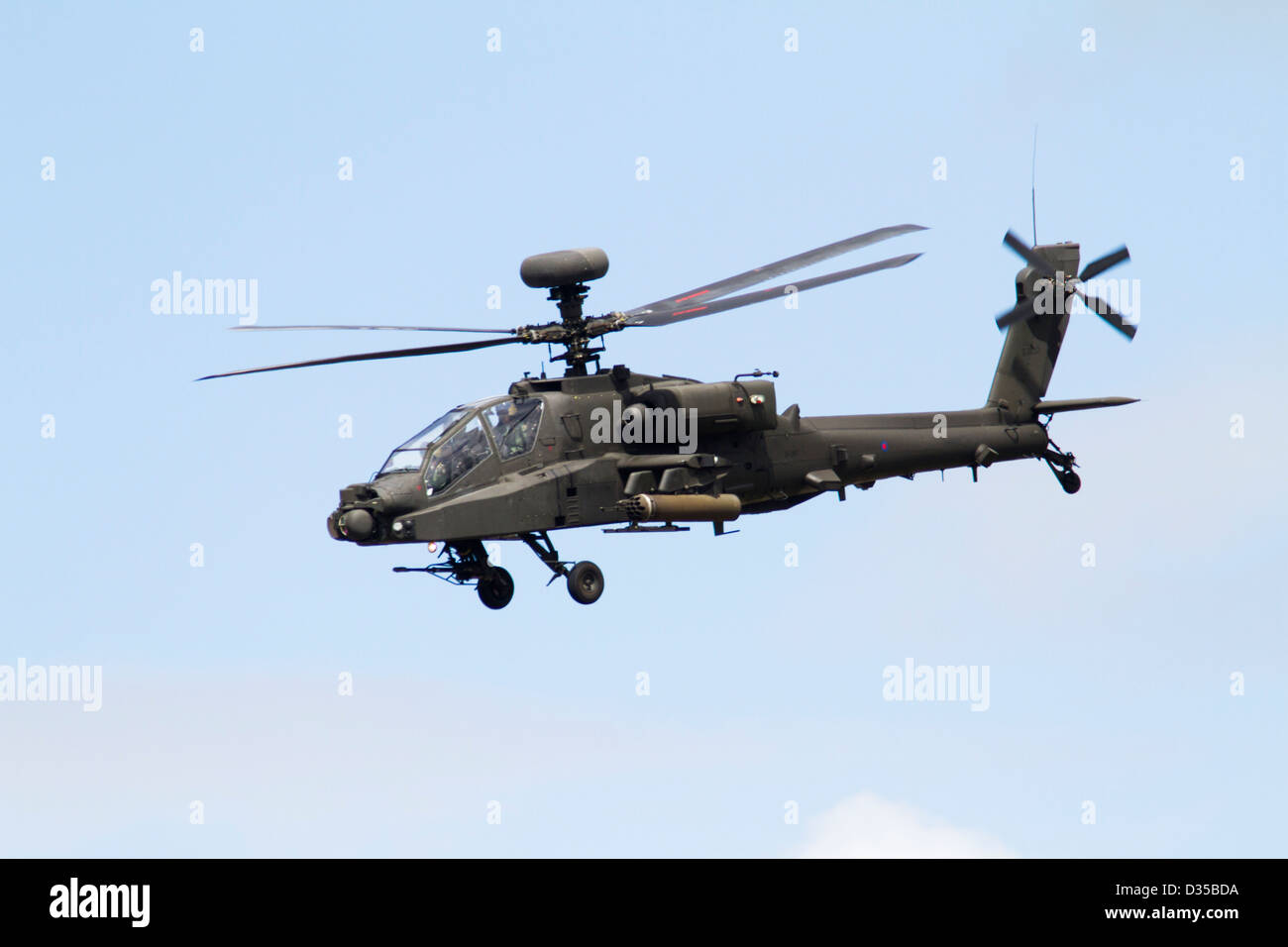 Army Air Corps Apache Helicopter in flight Stock Photo