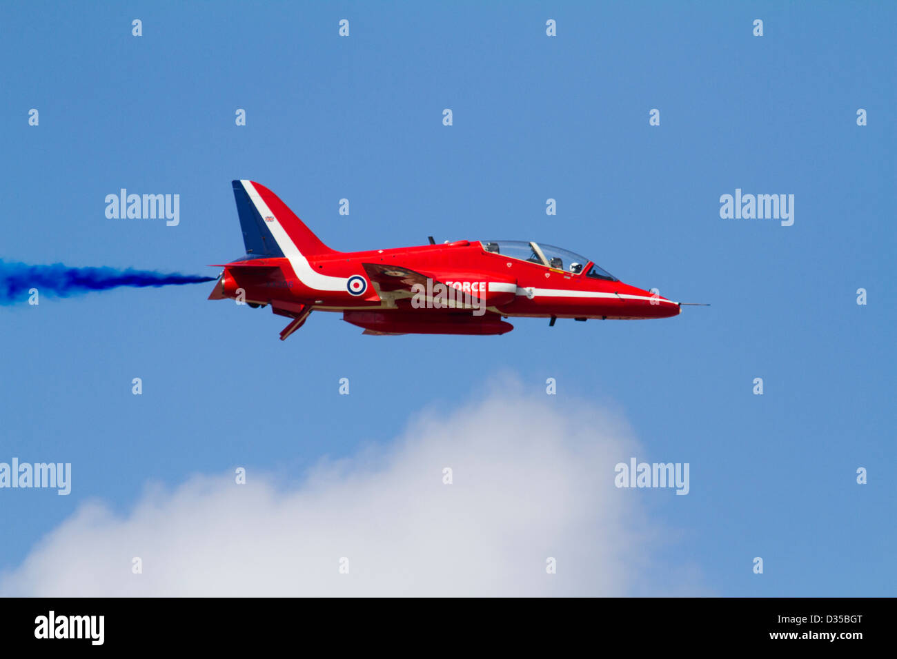 Red Arrow Hawk aircraft in flight Stock Photo