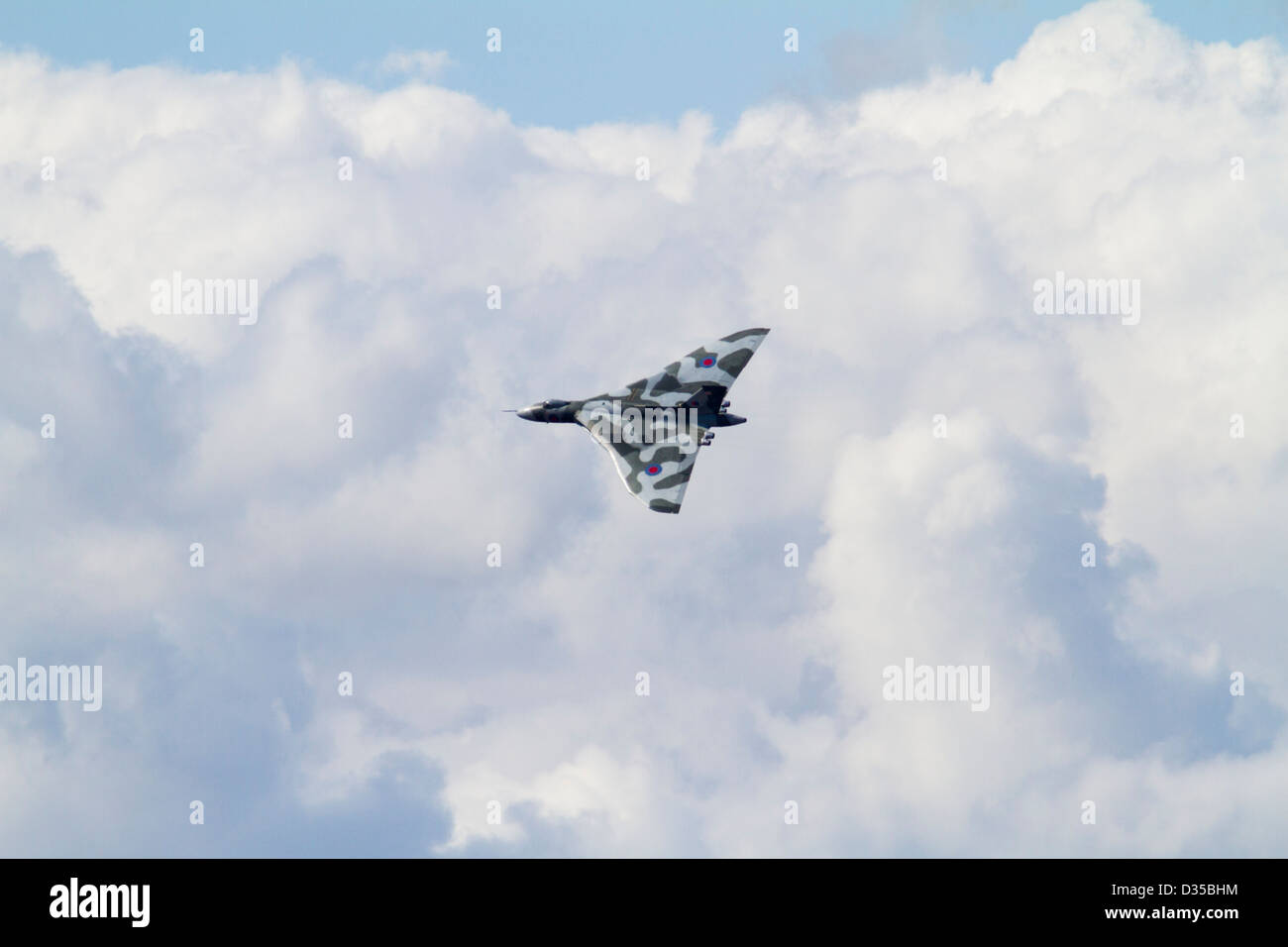 Vulcan XH558 banks over clouds Stock Photo