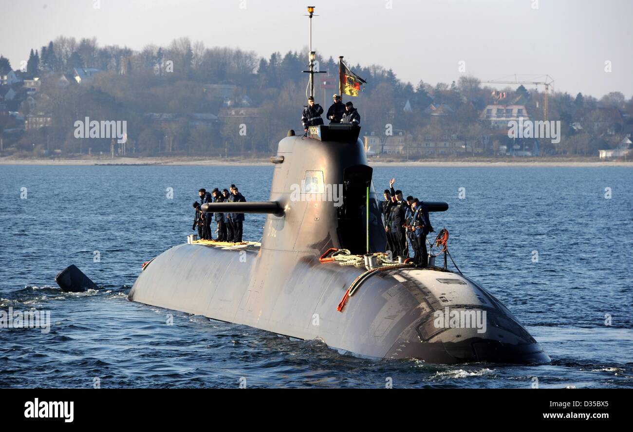 The German Navy's U32 submarine departs from the navy harbour in