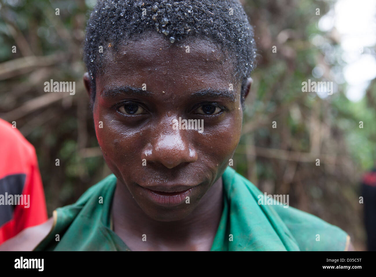 CONGO, 26th Sept 2012: Small scraps of gold during small-scale mining in a river, north west Congo. Stock Photo