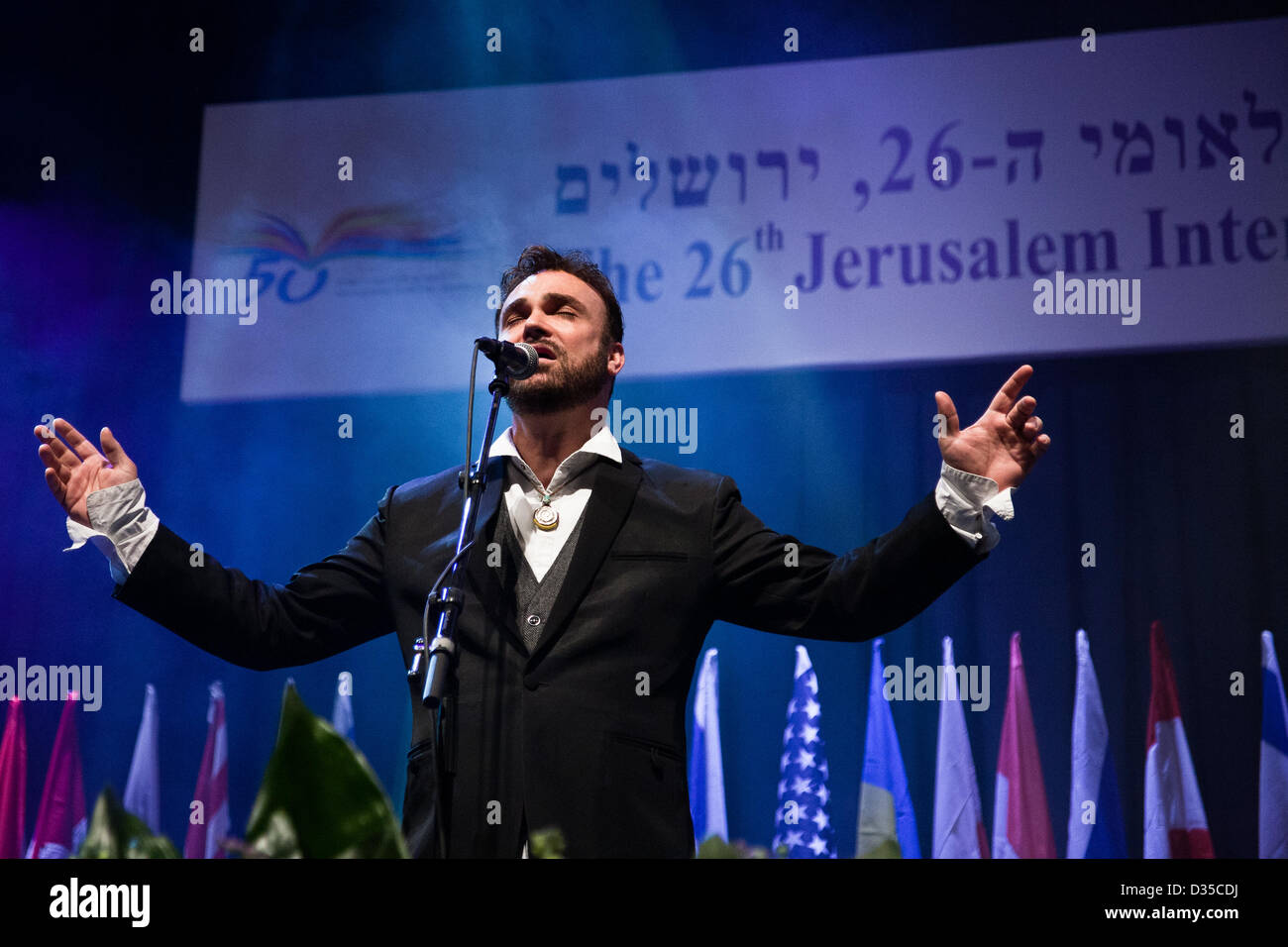 David D'Or, Israeli singer, composer, and songwriter, a countertenor with a vocal range of more than four octaves, performs at the opening ceremony of the Jerusalem International Book Fair. Jerusalem, Israel. 10-Feb-2013.  First held in 1963, the Jerusalem International Book Fair is a unique biennial event, business fair and a prestigious and important cultural event. 600 publishers and authors from more than 30 countries display more than 100,000 books. Stock Photo