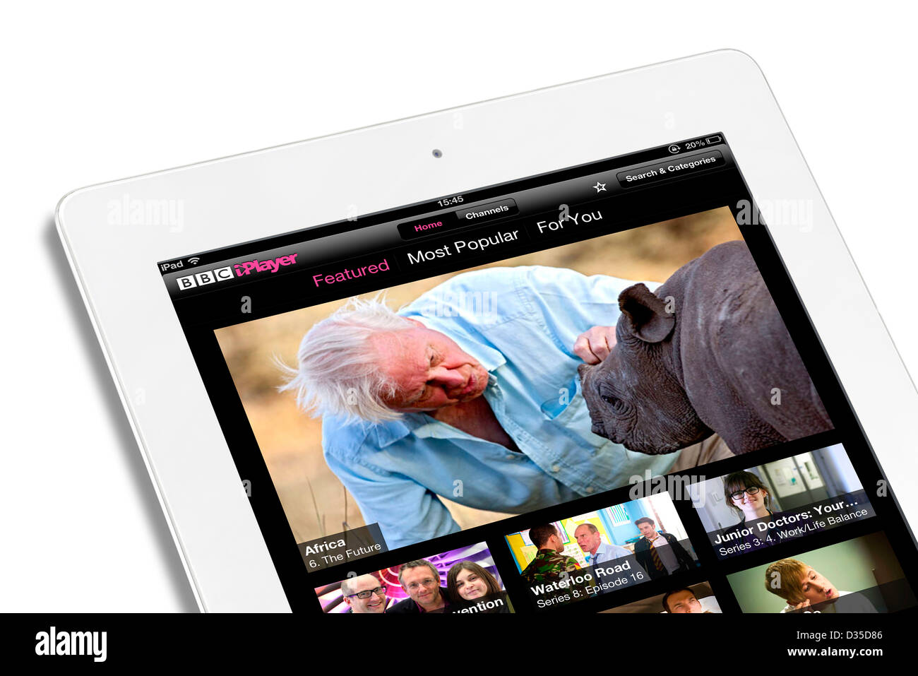 Browsing the BBC iPlayer online streaming on an Apple iPad 4th generation retina display tablet computer Stock Photo